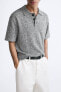 Textured knit polo shirt