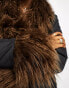 Native Youth longline cocoon puffer coat in black with brown faux fur trim