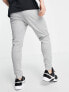 Nike Training Dri-FIT tapered joggers in light grey