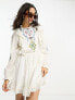 Фото #3 товара Reclaimed Vintage limited edition mini dress in white with cross stich embroidery