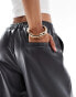 Фото #4 товара ASOS DESIGN Tall faux leather wide leg pull on trousers in charcoal