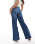 River Island petite flared jeans in mid-blue