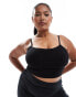 Фото #1 товара ASOS 4505 Curve Icon seamless rib yoga vest with inner bra in black