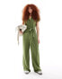 Фото #1 товара Mango tie waist jersey jumpsuit in khaki