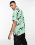 ASOS DESIGN relaxed shirt in green fish print