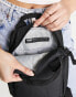 Levi's mini backpack in black with batwing logo