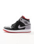 Air Jordan 1 mid trainers in black and red