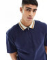 ASOS DESIGN relaxed rib polo with contrast tipping in navy