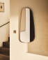 Irregular wall mirror