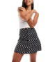 Фото #1 товара Miss Selfridge button through flippy mini skirt in black polka dot