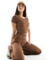 Фото #1 товара Urban Threads butter soft fitted short sleeve top in chocolate brown