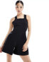 Edited cross back pinafore playsuit in black