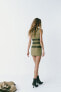 Фото #4 товара Платье с вощеным покрытием и ремнями ZARA