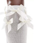 Reclaimed Vintage knee high socks with bows in white