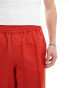 ASOS DESIGN wide nylon trousers in red with white side panel