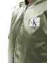 Calvin Klein Jeans satin badge logo bomber jacket in olive