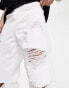 ASOS DESIGN baggy jeans with heavy rips in white