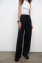 Loose-fitting darted trousers