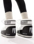 Moon Boot mid ankle snow boots in black and white