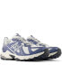 New Balance 610T trainers in blue and white