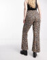 Noisy May Curve flared trousers in leopard print