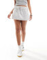 Фото #1 товара COLLUSION sweat mini skirt with raw detail in grey marl