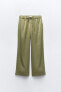 Palazzo trousers with shiny fabric