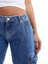 Фото #4 товара Calvin Klein Jeans extreme low rise baggy cargo in mid wash