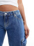 Фото #7 товара Calvin Klein Jeans extreme low rise baggy cargo in mid wash