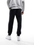 Фото #5 товара Jordan Essentials fleese joggers in black