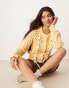 Фото #3 товара ASOS DESIGN crew neck cardigan in open stitch with bow detail in yellow