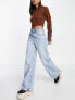 Фото #1 товара Weekday Ace high waist denim jeans in light stone wash blue