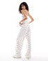 Фото #4 товара ASOS DESIGN strawberry ditsy wide leg trousers in white