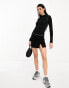 Vero Moda ribbed long sleeve top in black with contrast seam detail