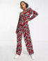 Monki jumpsuit with long sleeves in red all over print