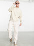 Фото #4 товара ASOS DESIGN oversized sweatshirt in beige with central embroidery