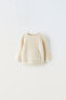 Knit sweater with pocket