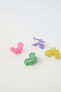 PACK OF FOUR SCALLOPED HAIR CLIPS