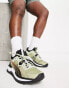 Puma Running Voyage Nitro trainers in khaki and black