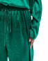 Flounce London Plus satin floaty trousers in emerald green co ord