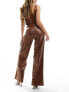 ASOS DESIGN leather look wide leg trousers in animal