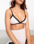 Фото #8 товара Monki mix and match triangle bra with lace trim and removeable padding in pink and black dolka dot