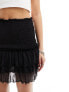 Monki mini ruffle skirt in black M - фото #5