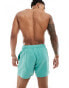 ASOS DESIGN swim shorts in short length in teal