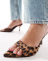 ASOS DESIGN Heyday pointed sole heeled mules in leopard