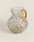 Blown glass jug with speckles