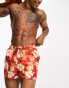 Фото #1 товара ASOS DESIGN swim shorts in short length in red floral print