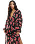 ASOS DESIGN long sleeve batwing plisse midi dress with tie back in black base red rose print