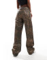 Фото #10 товара ASOS DESIGN mid rise baggy boyfriend jeans in metallic leopard print