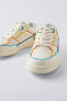 Minimalist lace-up sneakers with multicoloured trim